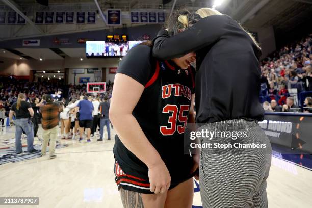 Alissa Pili of the Utah Utes is consoled by head coach Lynne Roberts of the Utah Utes after losing to Gonzaga Bulldogsin the second round of the NCAA...