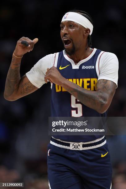 Kentavious Caldwell-Pope of the Denver Nuggets looks for a foul call agaomst the Memphis Grizzlies in the first quarter at Ball Arena on March 25,...