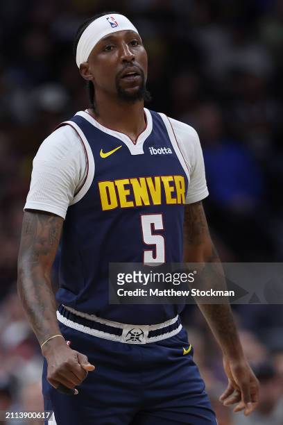 Kentavious Caldwell-Pope of the Denver Nuggets plays the Memphis Grizzlies in the first quarter at Ball Arena on March 25, 2024 in Denver, Colorado....