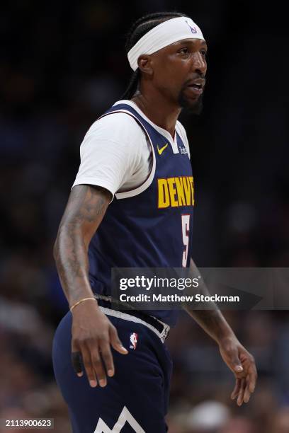 Kentavious Caldwell-Pope of the Denver Nuggets plays the Memphis Grizzlies in the first quarter at Ball Arena on March 25, 2024 in Denver, Colorado....