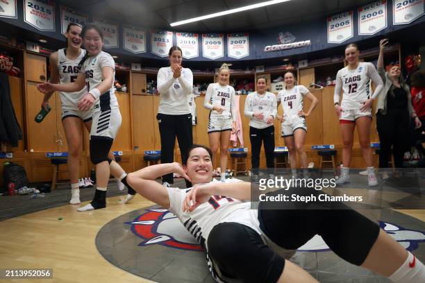 Kaylynne Truong of the Gonzaga Bulldogs celebrates in the locker room after beating Utah Utes in the second round of the NCAA Women's Basketball...