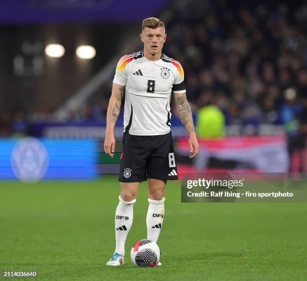 Toni Kroos of Germany looks on during the international friendly match between France and Germany at Groupama Stadium on March 23, 2024 in Lyon,...