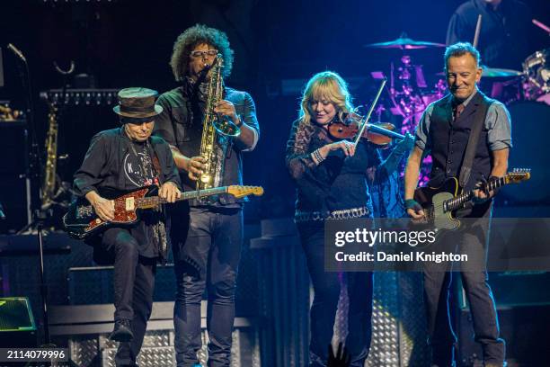 Nils Lofgren, Jake Clemons, Soozie Tyrell, and Bruce Springsteen of Bruce Springsteen and the E Street Band perform on stage at Pechanga Arena on...