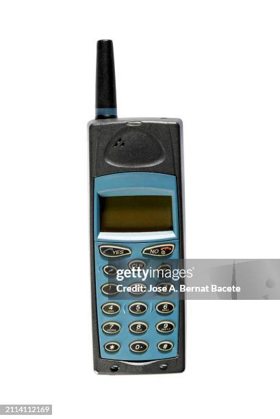 old mobile phone on a white background. - telephone receiver stock pictures, royalty-free photos & images