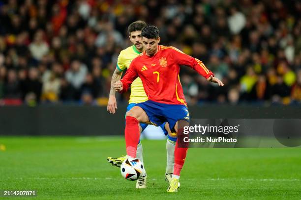 Alvaro Morata Centre-Forward of Spain and Atletico de Madrid controls the ball during the friendly match between Spain and Brazil at Estadio Santiago...