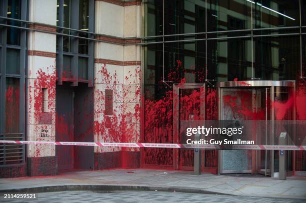 The exterior of BNY Mellon is vandalised by supporters of Palestine Action on March 26, 2024 in London, England. Palestine Action activists vandalise...