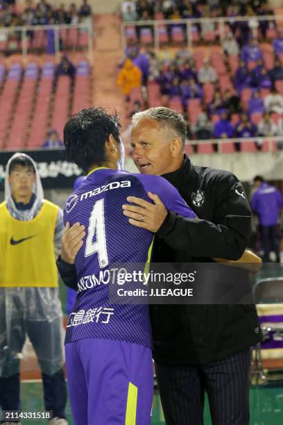 Hiroki Mizumoto of Sanfrecce Hiroshima greets head coach Jan Jonsson of Shimizu S-Pulse prior to the J.League J1 match between Sanfrecce Hiroshima...