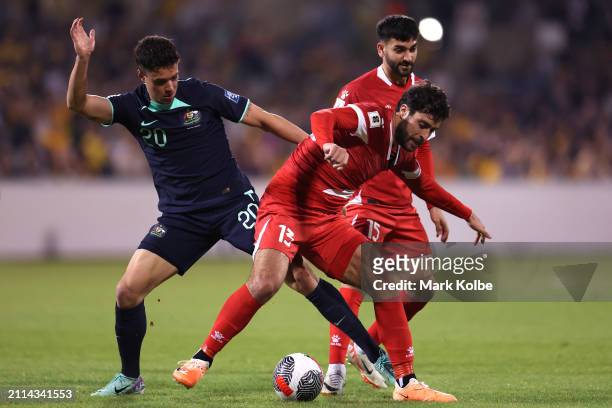 Khalil Khamis of Lebanon and John Iredale of Australia compete for the ball during the FIFA World Cup 2026 Qualifier match between Australia...