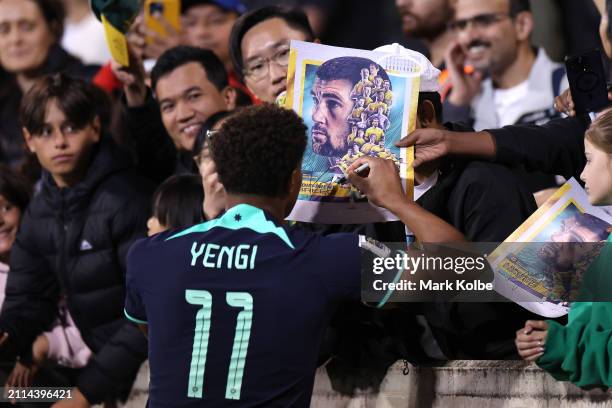 Kusini Yengi of Australia signs autographs after the FIFA World Cup 2026 Qualifier match between Australia Socceroos and Lebanon at GIO Stadium on...