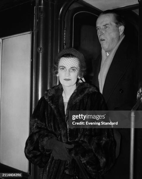 Margaret Campbell, Duchess of Argyll , and her husband Ian Campbell, 11th Duke of Argyll , arriving by train at Waterloo Station in London, February...