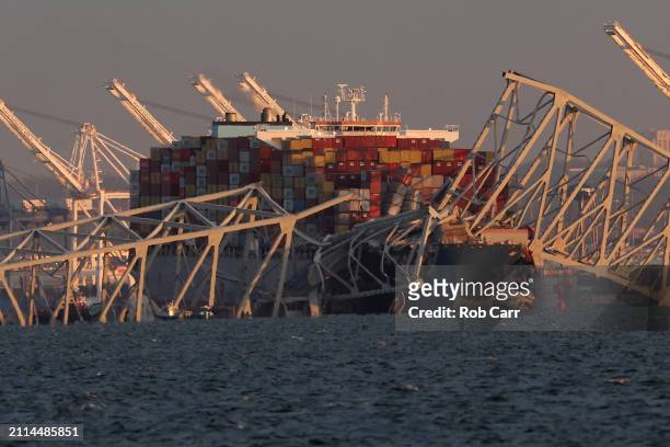 Cargo ship is shown after running into and collapsing the Francis Scott Key Bridge on March 26, 2024 in Baltimore, Maryland. Rescuers are searching...