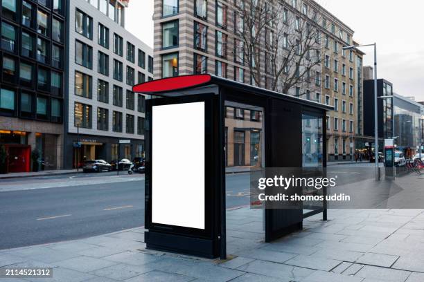blank digital billboard at a bus stop in central london - busshållplats bildbanksfoton och bilder