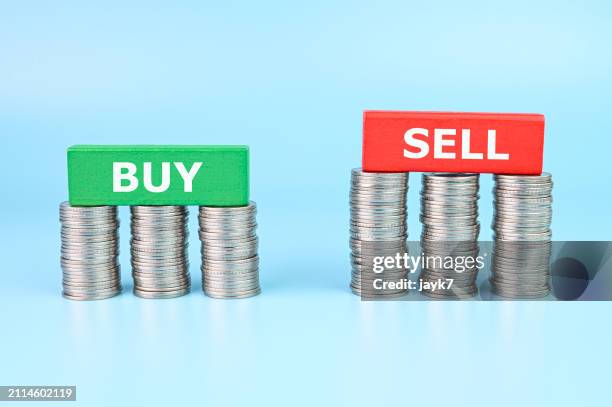 buy and sell - words of wisdom stock pictures, royalty-free photos & images