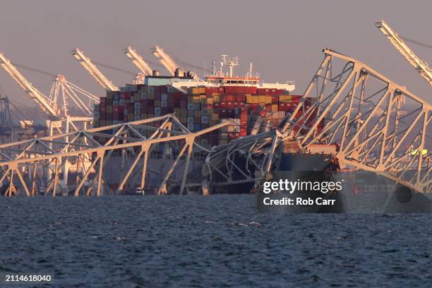 Cargo ship is shown after running into and collapsing the Francis Scott Key Bridge on March 26, 2024 in Baltimore, Maryland. Rescuers are searching...