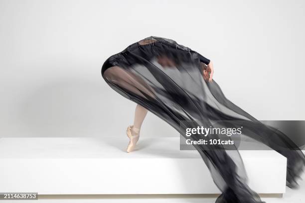 beautiful ballerina dancing with black tulle - 101cats stock pictures, royalty-free photos & images