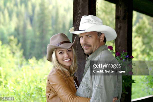 This undated handout image shows actor Kevin Costner and Christine Baumgartner posing. The couple annouced their engagement June 26, 2003. No date...