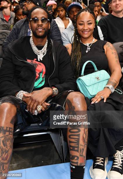 Rapper 2 Chainz and Kesha Epps attend the game between the Boston Celtics and the Atlanta Hawks at State Farm Arena on March 25, 2024 in Atlanta,...