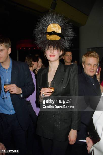 Scottish fashion model Honor Fraser attends a Vogue 'Visionaire' party at Harvey Nichols, London, 24th February 1999.