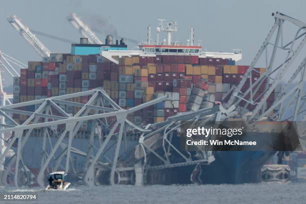 Cargo ship is shown after running into and collapsing the Francis Scott Key Bridge on March 26, 2024 in Baltimore, Maryland. Rescuers are searching...