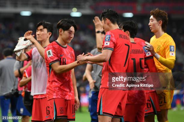 Lee Kang-in and Son Heung-min of South Korea celebrate the team's 3-0 victory in the FIFA World Cup Asian second qualifier Group C match between...