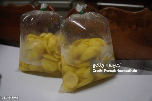 pickled mango in plastic bag - mango pickle stock pictures, royalty-free photos & images