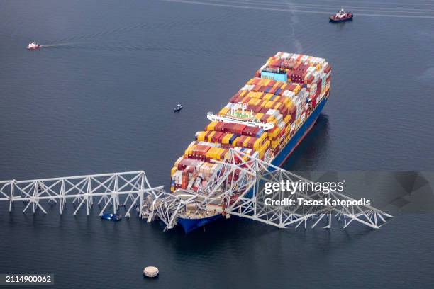 In an aerial view, cargo ship Dali is seen after running into and collapsing the Francis Scott Key Bridge on March 26, 2024 in Baltimore, Maryland....