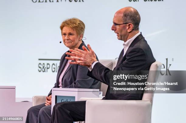 From left, S&P Global Vice Chairman, Daniel Yergin, Oxy President and Chief Executive Officer Vicki Hollub and Microsoft Executive Vice President,...