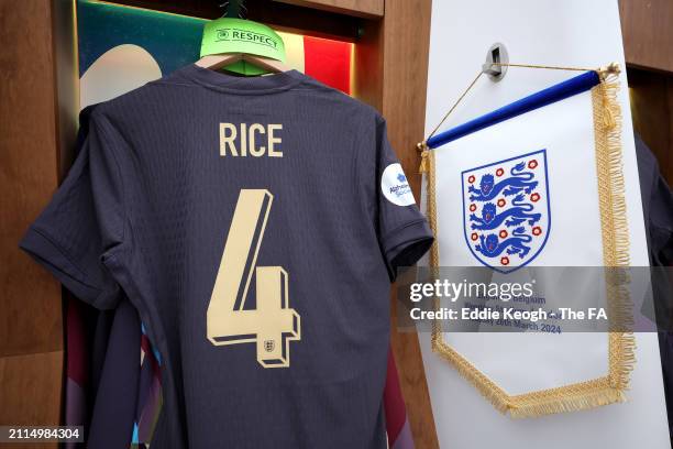 The captain's armband and a pennant are seen alongside the shirt of Declan Rice of England in the dressing room prior to the international friendly...