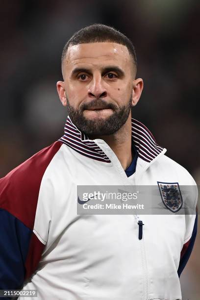 Kyle Walker of England lines up for the National Anthems ahead of the international friendly match between England and Brazil at Wembley Stadium on...
