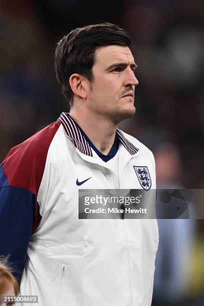 Harry Maguire of England lines up for the National Anthems ahead of the international friendly match between England and Brazil at Wembley Stadium on...