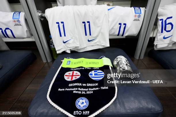 The UEFA Respect captain's armband is seen alongside the match pennant inside the Greece dressing room prior to the UEFA EURO 2024 Play-Offs final...