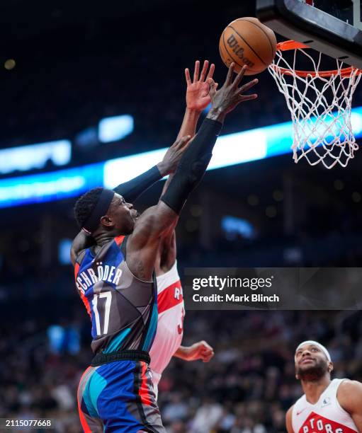 Dennis Schroder of the Brooklyn Nets goes to the basket against the Toronto Raptors during the first half of their basketball game at the Scotiabank...