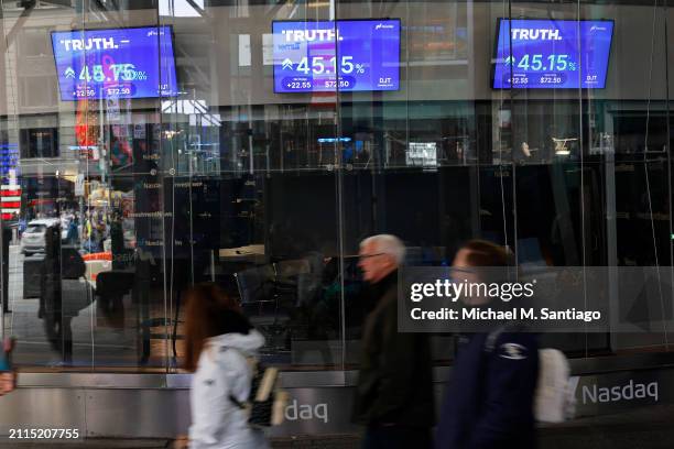 Trump Media & Technology Group stock market trading information is seen on a television at the Nasdaq Marketplace on March 26, 2024 in New York City....