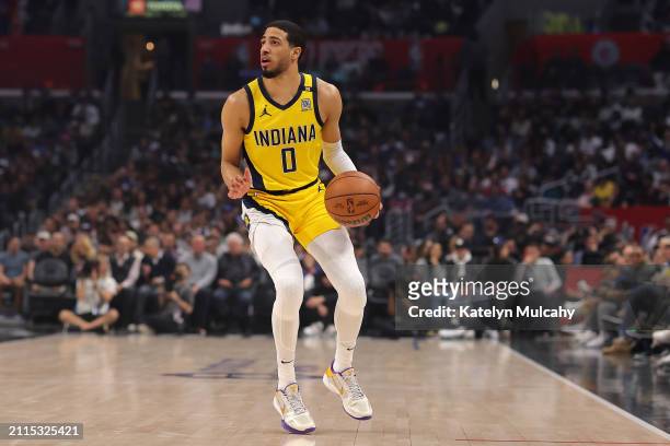 Tyrese Haliburton of the Indiana Pacers handles the ball during the first quarter against the Los Angeles Clippers at Crypto.com Arena on March 25,...