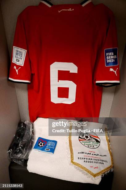 The FIFA Football Unites the World Captain's Armband and match pennant are displayed with the shirt of XX inside the Egypt dressing room prior to the...