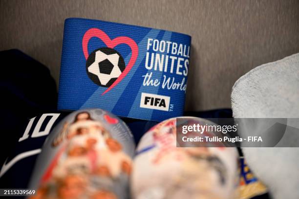 The FIFA Football Unites the World Captain's Armband is displayed with Luka Modric's kit inside the Croatia dressing room prior to the FIFA Series...