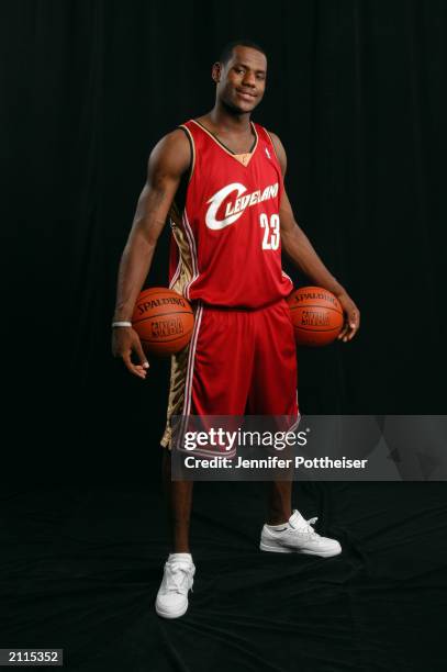 LeBron James poses for a portrait in a Cleveland Cavaliers uniform prior to the 2003 NBA Draft at the Westin Times Square Hotel on June 25, 2003 in...