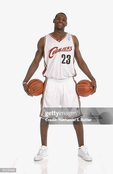 LeBron James poses for a portrait in a Clevelend Cavaliers uniform prior to the 2003 NBA Draft at the Westin Times Square Hotel on June 25, 2003 in...