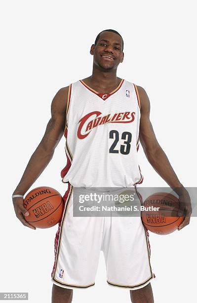 LeBron James poses for a portrait in a Clevelend Cavaliers uniform prior to the 2003 NBA Draft at the Westin Times Square Hotel on June 25, 2003 in...
