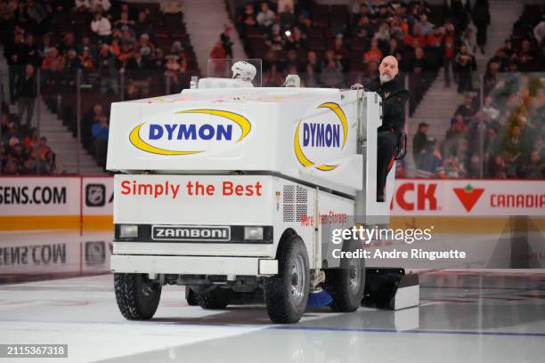 Member of the ice crew drives a Zamboni ice resurfacing machine during the intermission of an NHL game between the Ottawa Senators and the Edmonton...