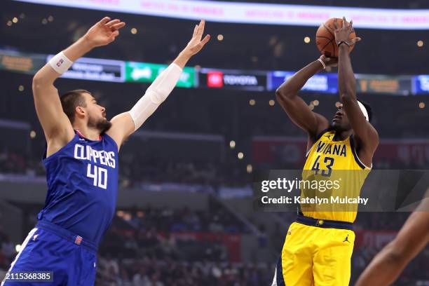 Pascal Siakam of the Indiana Pacers shoots the ball against Ivica Zubac of the Los Angeles Clippers during the first quarter at Crypto.com Arena on...