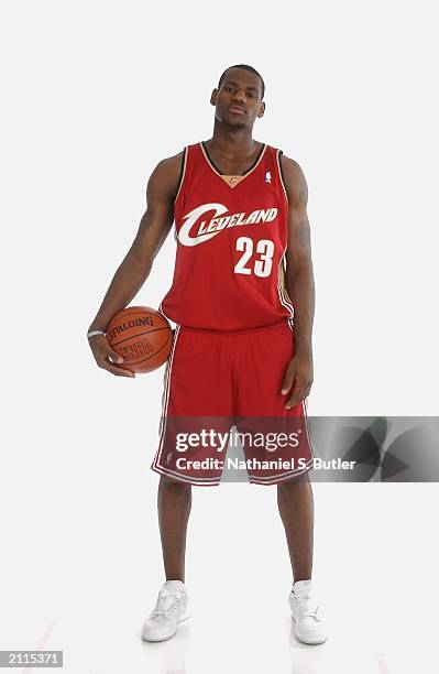LeBron James poses for a portrait in a Clevelend Cavaliers uniform prior to the 2003 NBA Draft at the Westin Times Square Hotel on June 25, 2003 in...