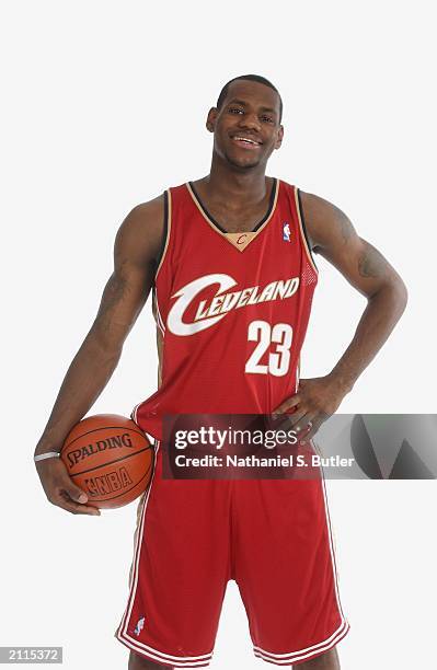 LeBron James poses for a portrait in a Clevelend Cavaliers uniform prior to the 2003 NBA Draft at the Westin Times Square Hotel on June 25, 2003 in...