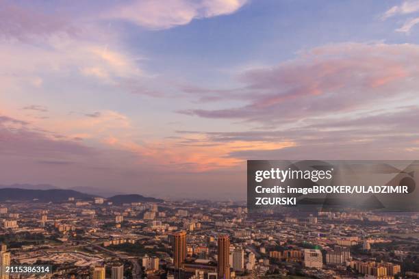 dramatic purple sky and clouds over kuala lumpur city centre, malaysia, asia - malaysian road stock pictures, royalty-free photos & images