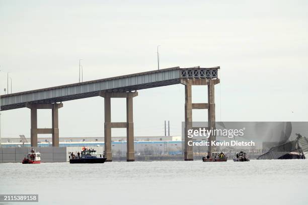 One remaining end of the Francis Scott Key Bridge stands in the water after the bridge collapsed when the cargo ship Dali ran into and collapsed it...
