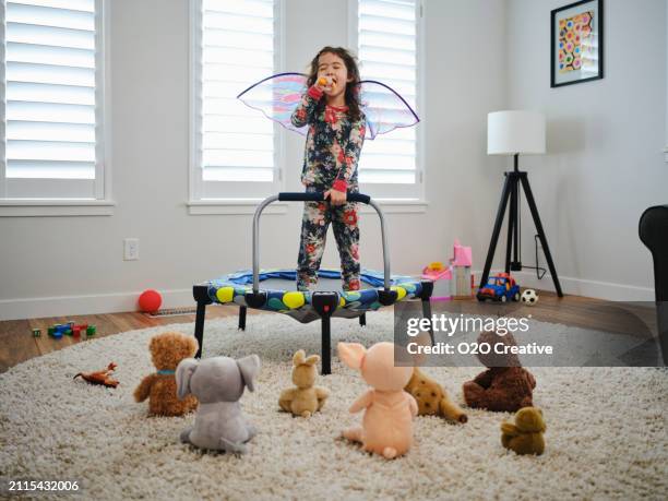 preschooler playing a make-believe concert - dressing up stock pictures, royalty-free photos & images