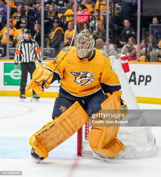 Juuse Saros of the Nashville Predators tends net against the Detroit Red Wings during an NHL game at Bridgestone Arena on March 23, 2024 in...