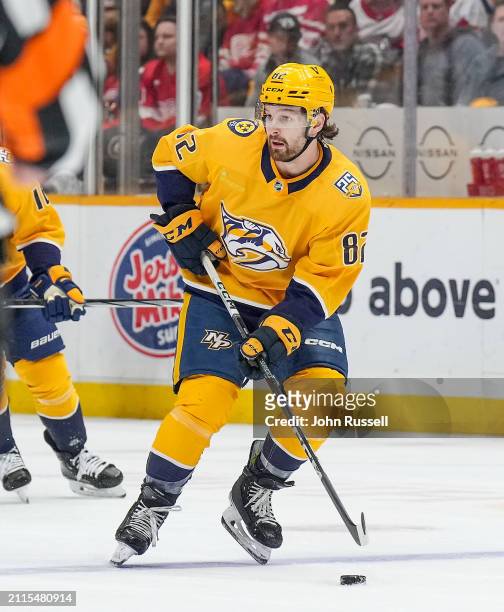 Tommy Novak of the Nashville Predators skates against the Detroit Red Wings during an NHL game at Bridgestone Arena on March 23, 2024 in Nashville,...