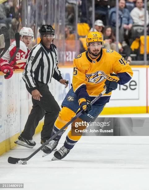 Alexandre Carrier of the Nashville Predators skates against the Detroit Red Wings during an NHL game at Bridgestone Arena on March 23, 2024 in...