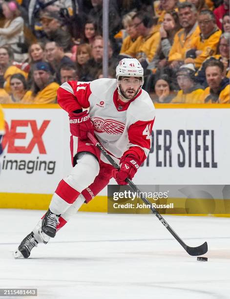 Shayne Gostisbehere of the Detroit Red Wings skates against the Nashville Predators during an NHL game at Bridgestone Arena on March 23, 2024 in...